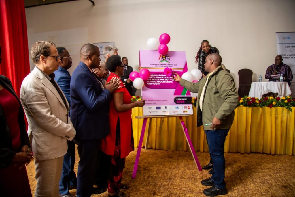 The State Minister for Gender, Labour and Social Development in charge of Children and Youth Affairs, Balaam Barugahara Ateenyi, launches the guidelines.