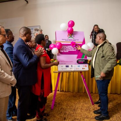The State Minister for Gender, Labour and Social Development in charge of Children and Youth Affairs, Balaam Barugahara Ateenyi, launches the guidelines.