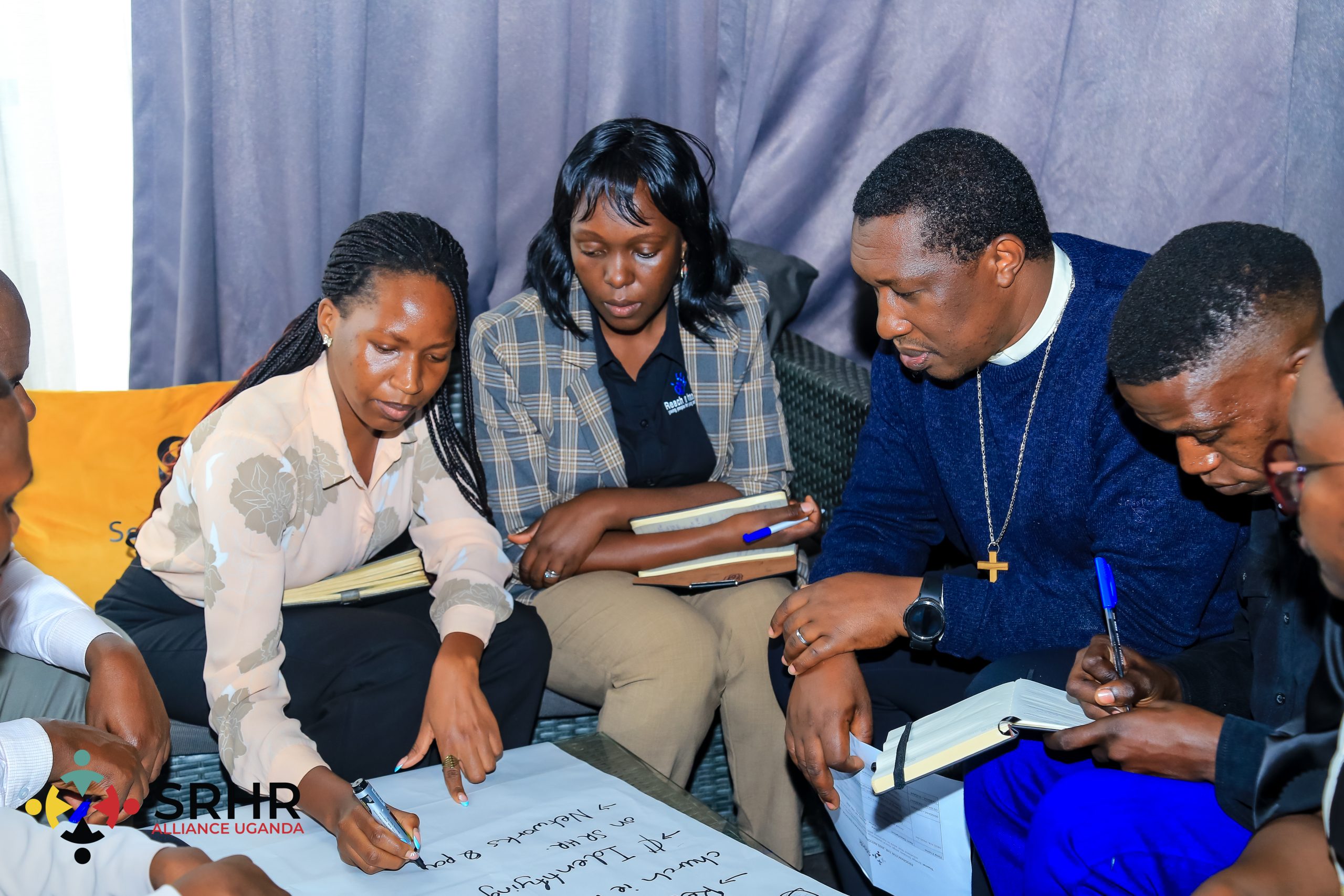 Religious leaders and participants during a group discussion