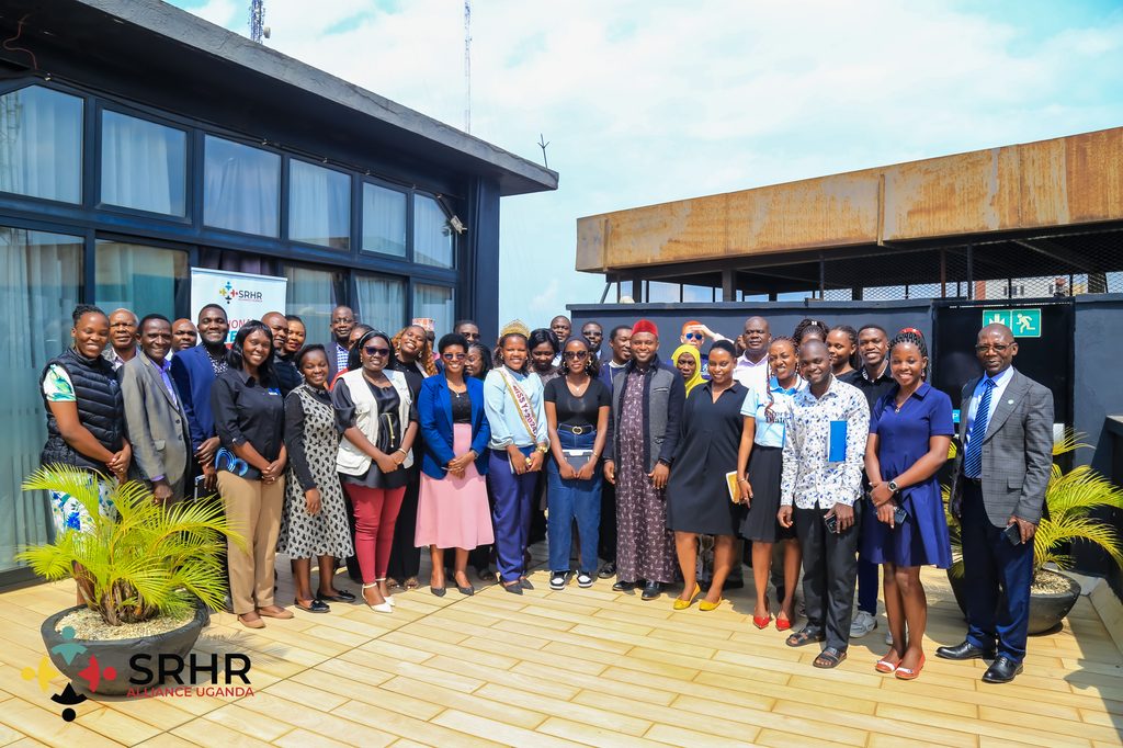 SRHR Alliance Uganda staff, Religious leaders, partners and stakeholders in a group picture after the dialogue