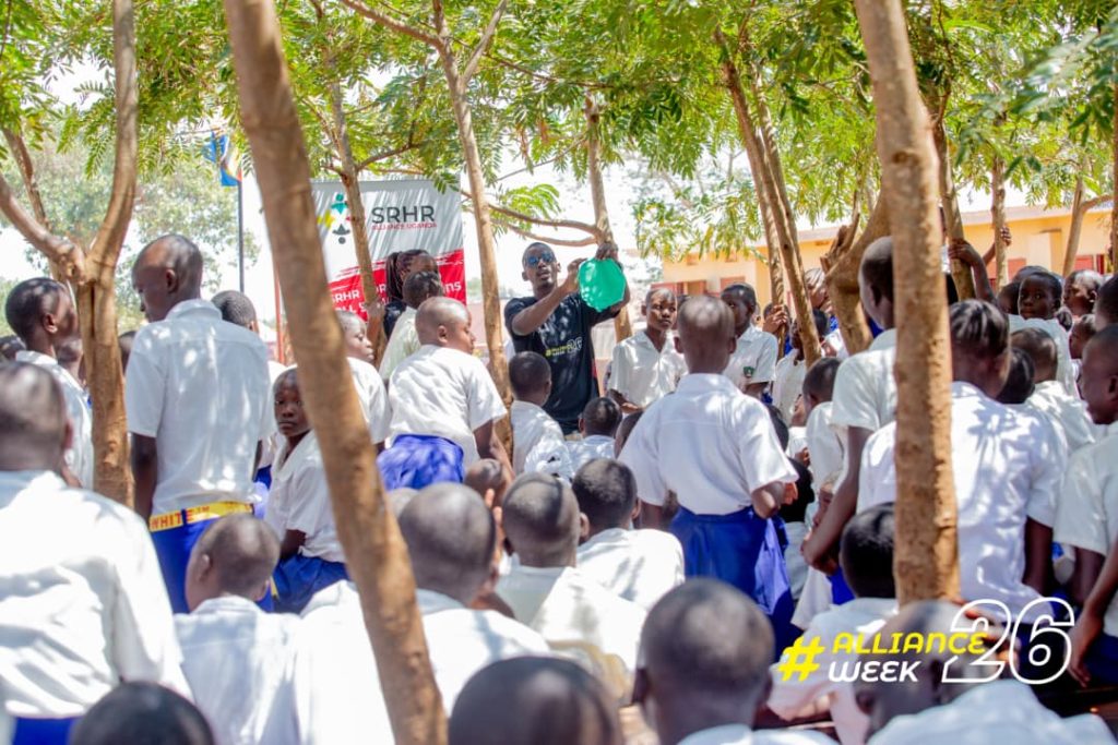 Namayingo Primary School Pupils learning how to make reusable pads