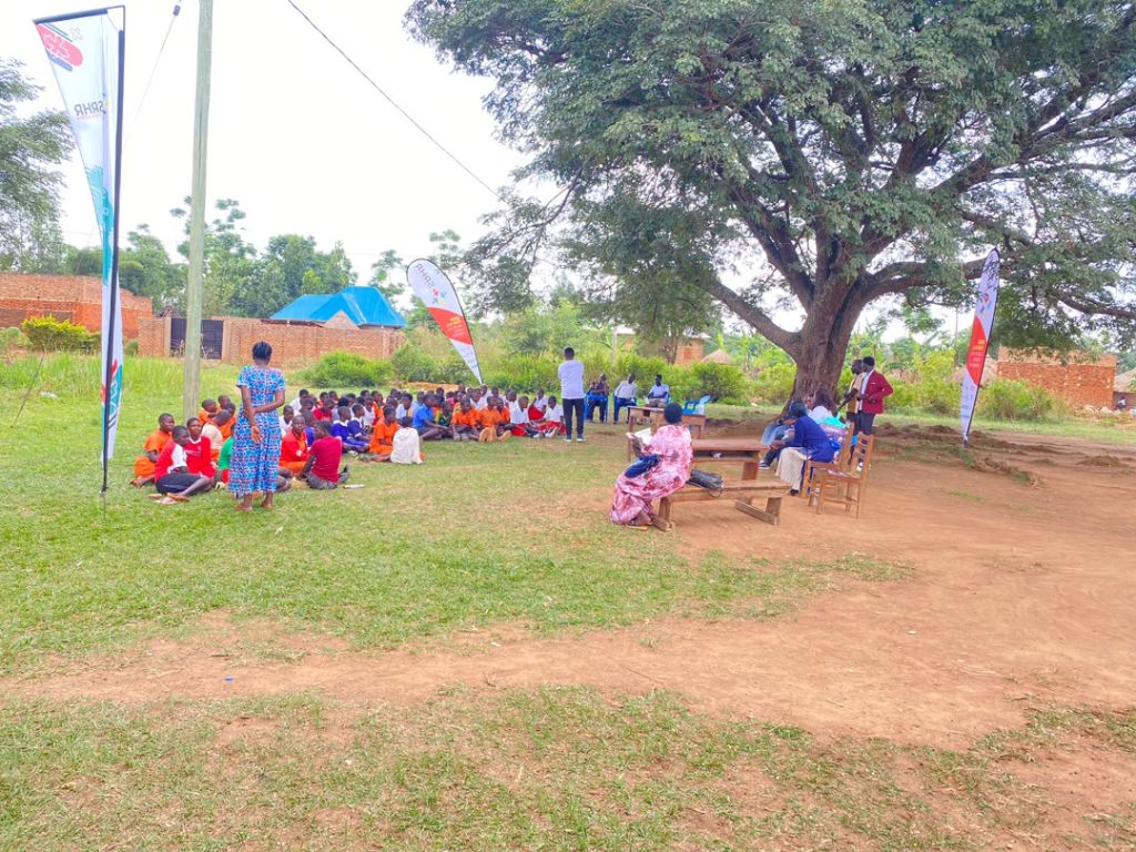 Young people being taken through a menstrual hygiene session